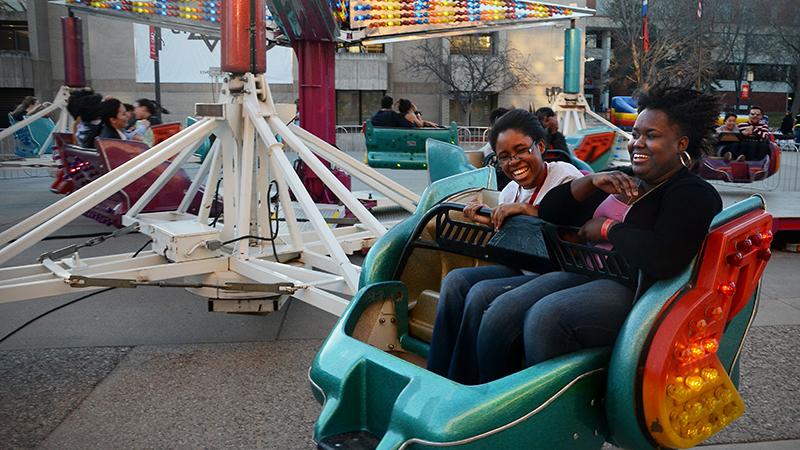 Two students on carnival ride