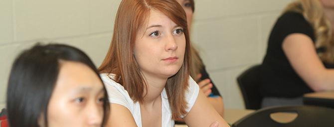 St. Cloud State students listen intently during class